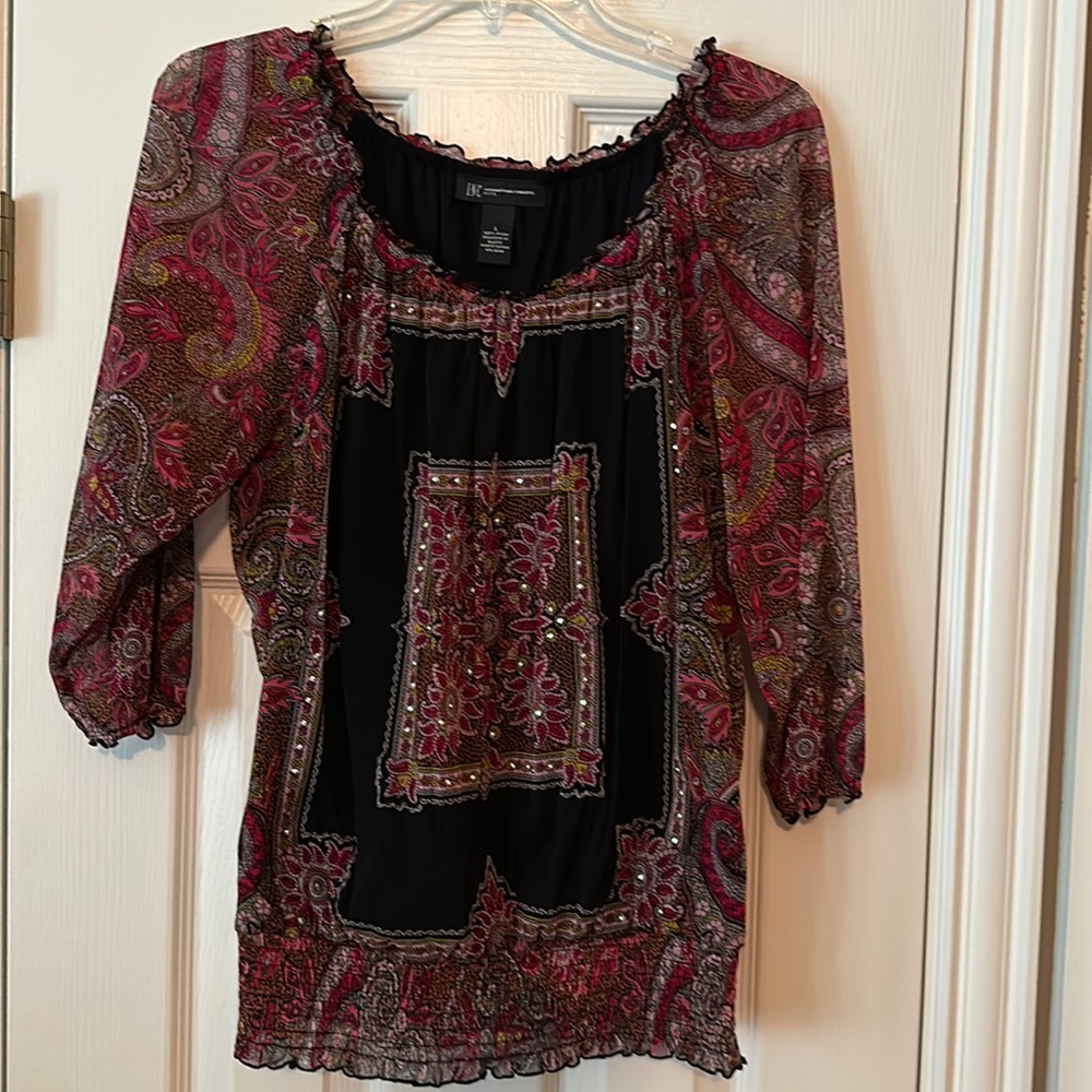 L INC brand top